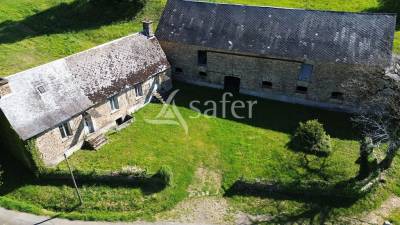 En Corrèze, à l'écart du voisinage, à rénover ensemble de b