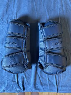Gu&ecirc;tres de dressage bleu