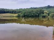 Propriété à rénover sur 60ha avec étang, proche Terrasson