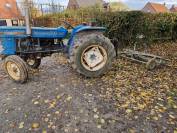 Tracteur Iseki , avec herse Ekeep 