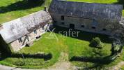 En Corrèze, à l'écart du voisinage, à rénover ensemble de b