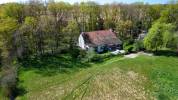 Maison 8 chambres avec 2 box sur 1 hectare environ