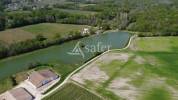Demeures de CHARME avec ETANG + 50 hectares de terres agricoles
