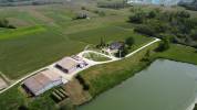 Demeures de CHARME avec ETANG + 50 hectares de terres agricoles