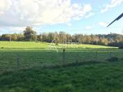 Propriété agricole bâtie d'environ 20 ha à l'écart du voisi