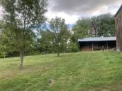 propriété avec chalet et dépendance