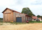 Belle propriété bâtie sur 17ha avec gîtes et verger, proche