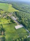 cour 6 boxes avec ses paddocks et son studio Yvelines